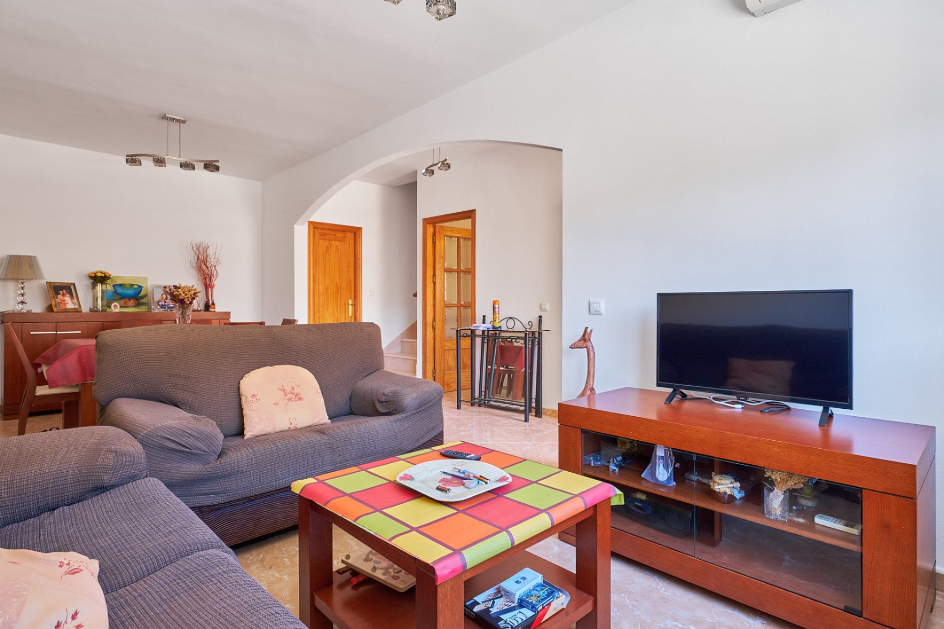 Bright living room of duplex in Turre with air conditioning and comfortable space.