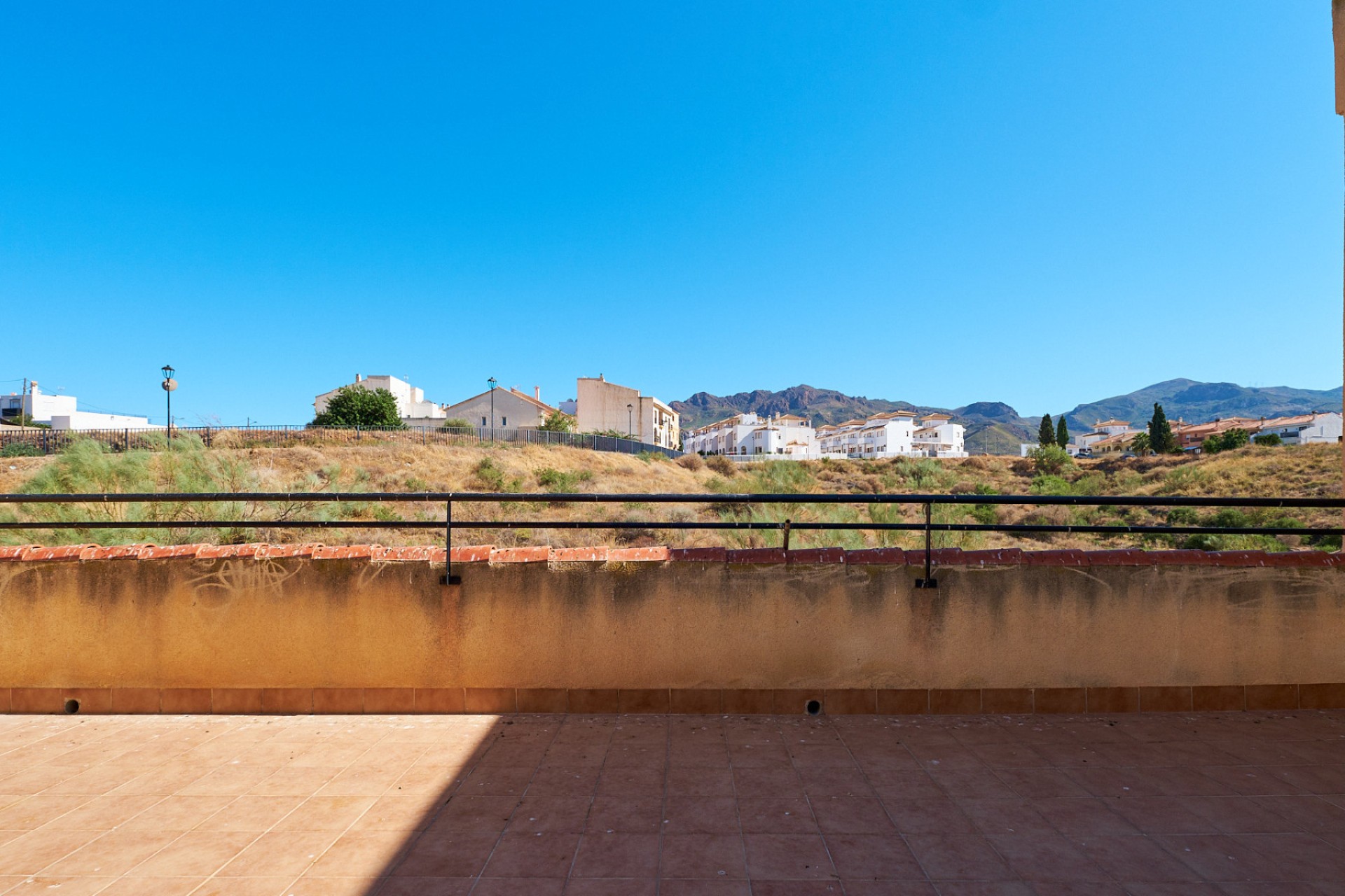 Large private terrace with mountain views in duplex for sale in Turre.