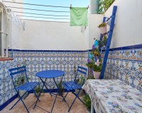  Privépatio met overdekte wasruimte in eengezinswoning in de provincie Almería, goed onderhouden buitenruimte.