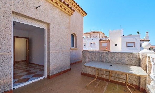 Private terrace with outdoor table in detached villa for sale in Turre, Almería.